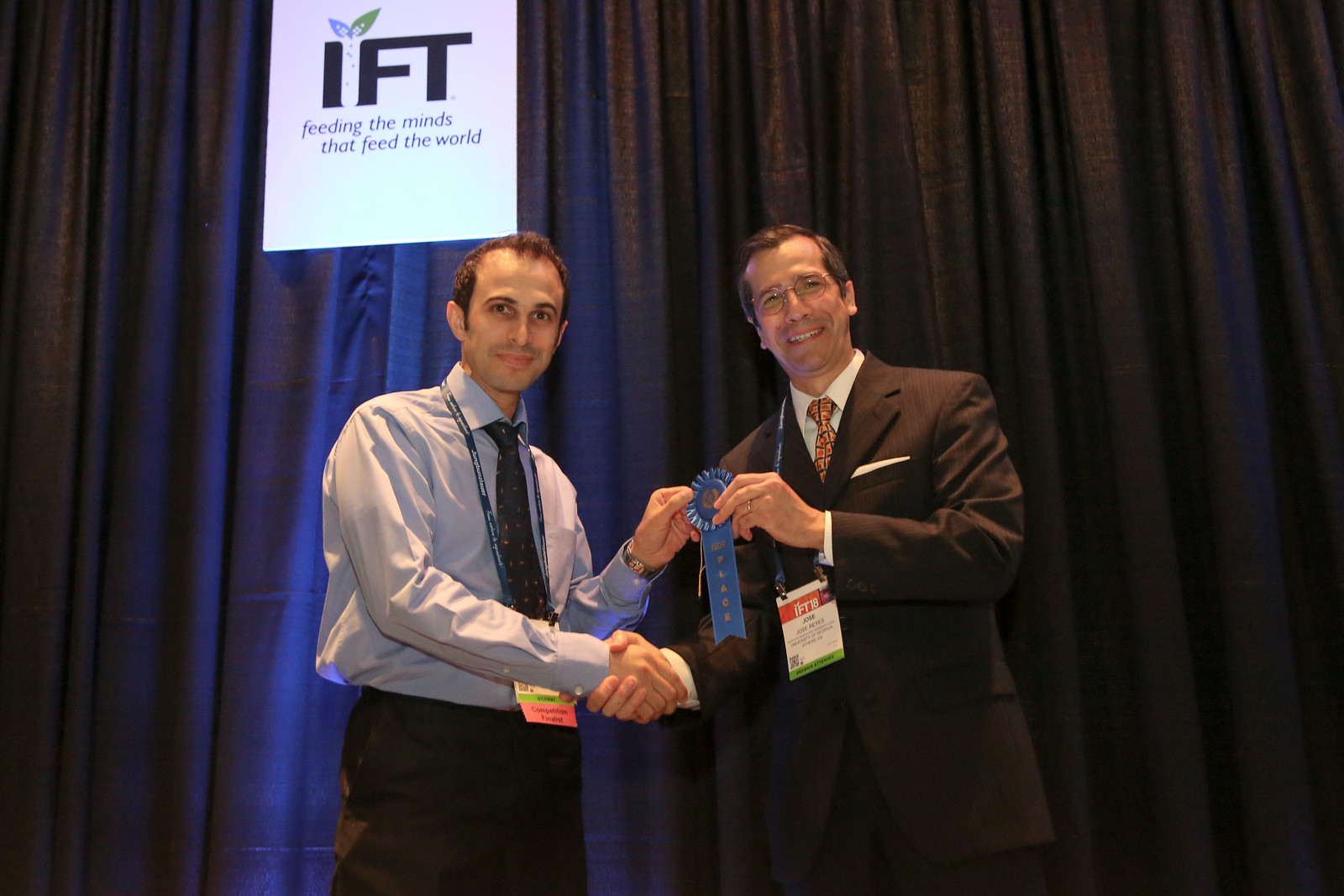Ali while receiving the 1st place at IFT18 Student Research Paper Poster Competition.