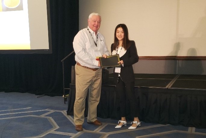 Jessica while receiving the Graduate Student Research Scholarship at the 2019 DGTC Symposium in Minneapolis, MN.