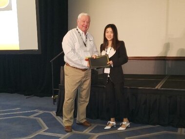 Jessica while receiving the Graduate Student Research Scholarship at the 2019 DGTC Symposium in Minneapolis, MN.