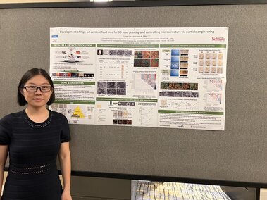 Lingyi presenting her poster at COFE22 in Rayleigh, NC.